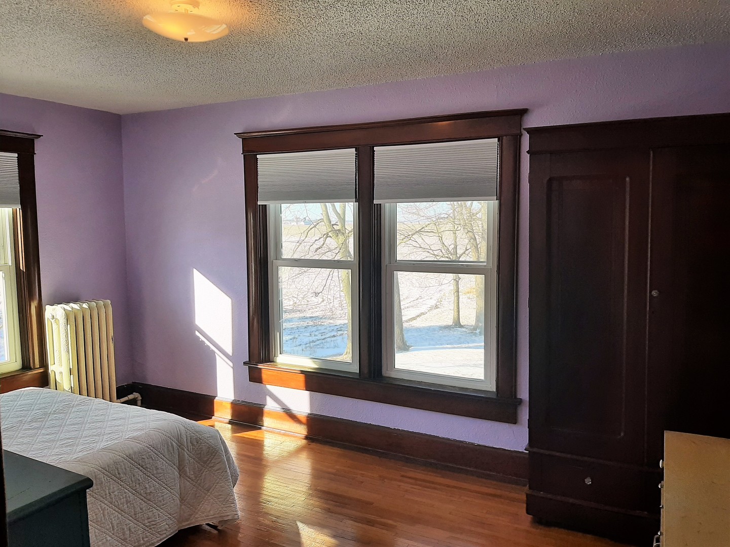 1449 Town Line Road Steward, IL 60553 - Photo 24 of 32 a bedroom with a bed and wooden floor