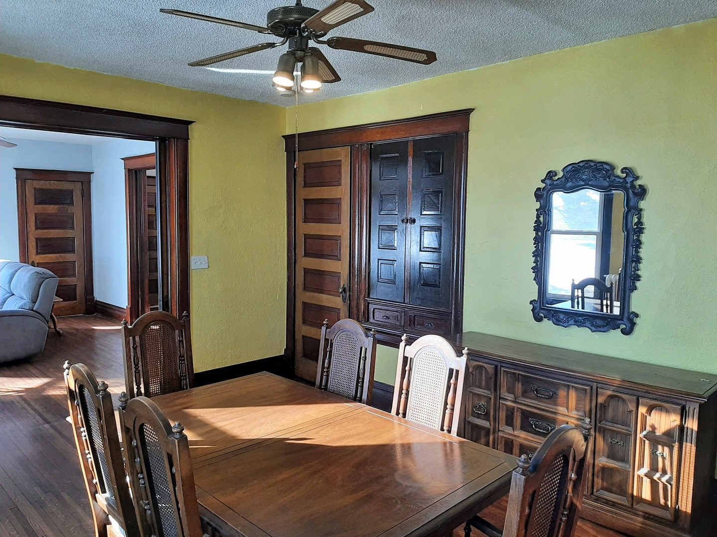 1449 Town Line Road Steward, IL 60553 - Photo 6 of 32 a view of a dining room with furniture and a chandelier