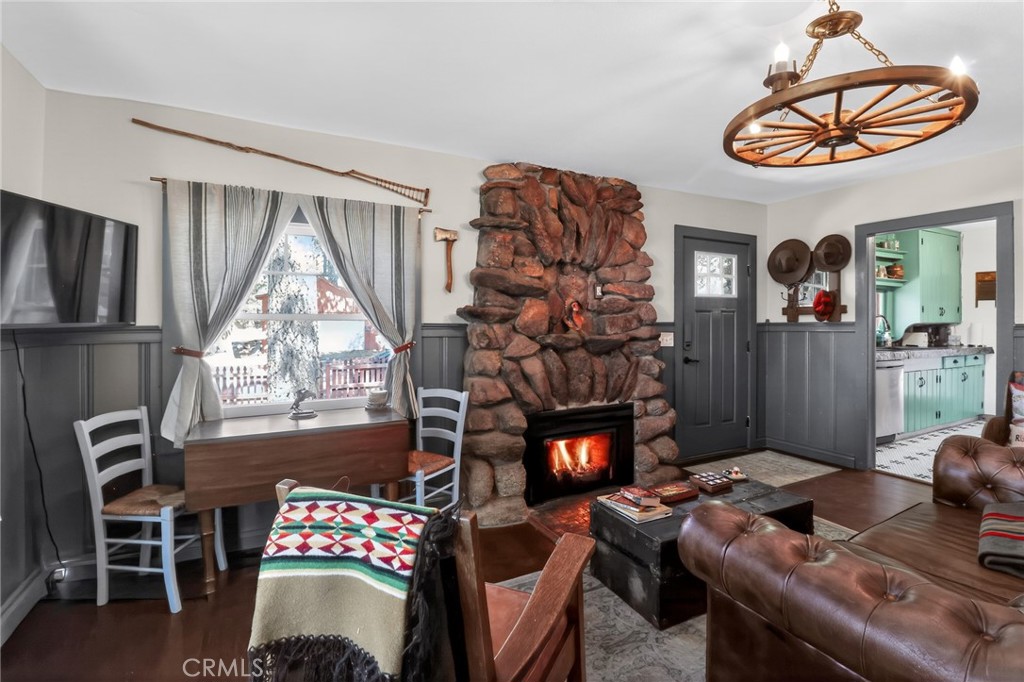 2775 View Running Springs, CA 92382 - Photo 11 of 30 a living room with furniture a window and a fireplace