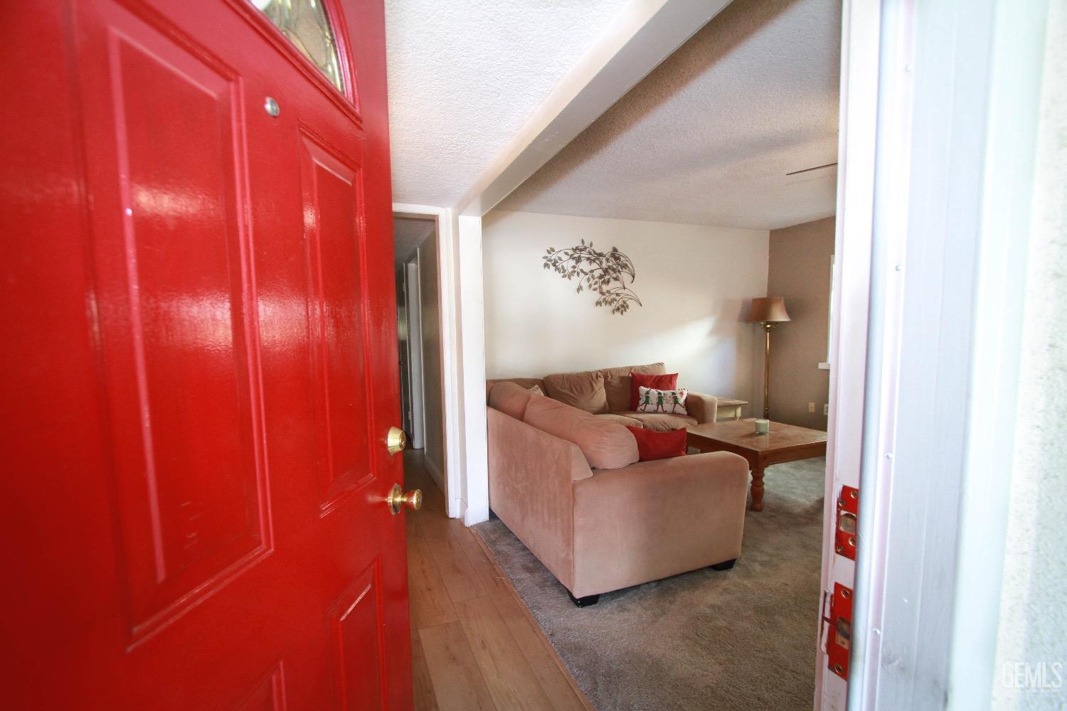 Undisclosed Address Bakersfield, CA 93306 - Photo 3 of 19 a bed room with a bed and a lamp