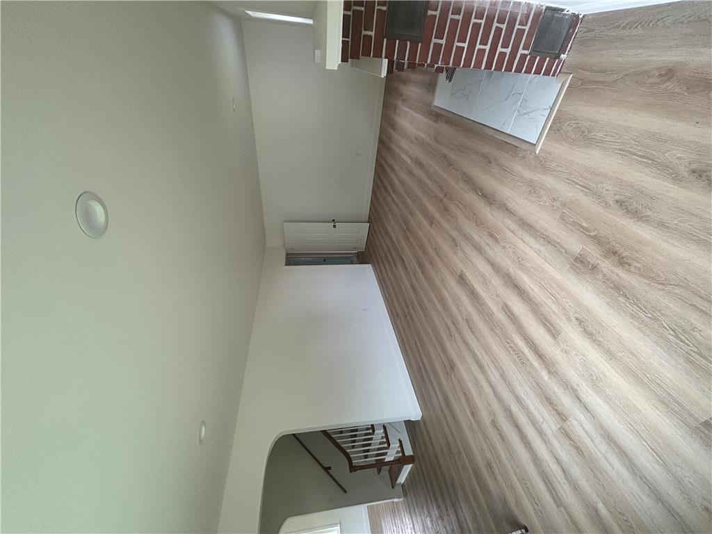 848 Hausman Road Allentown, PA 18104 - Photo 10 of 11 Newly installed wood flooring creates an inviting and spacious living area.