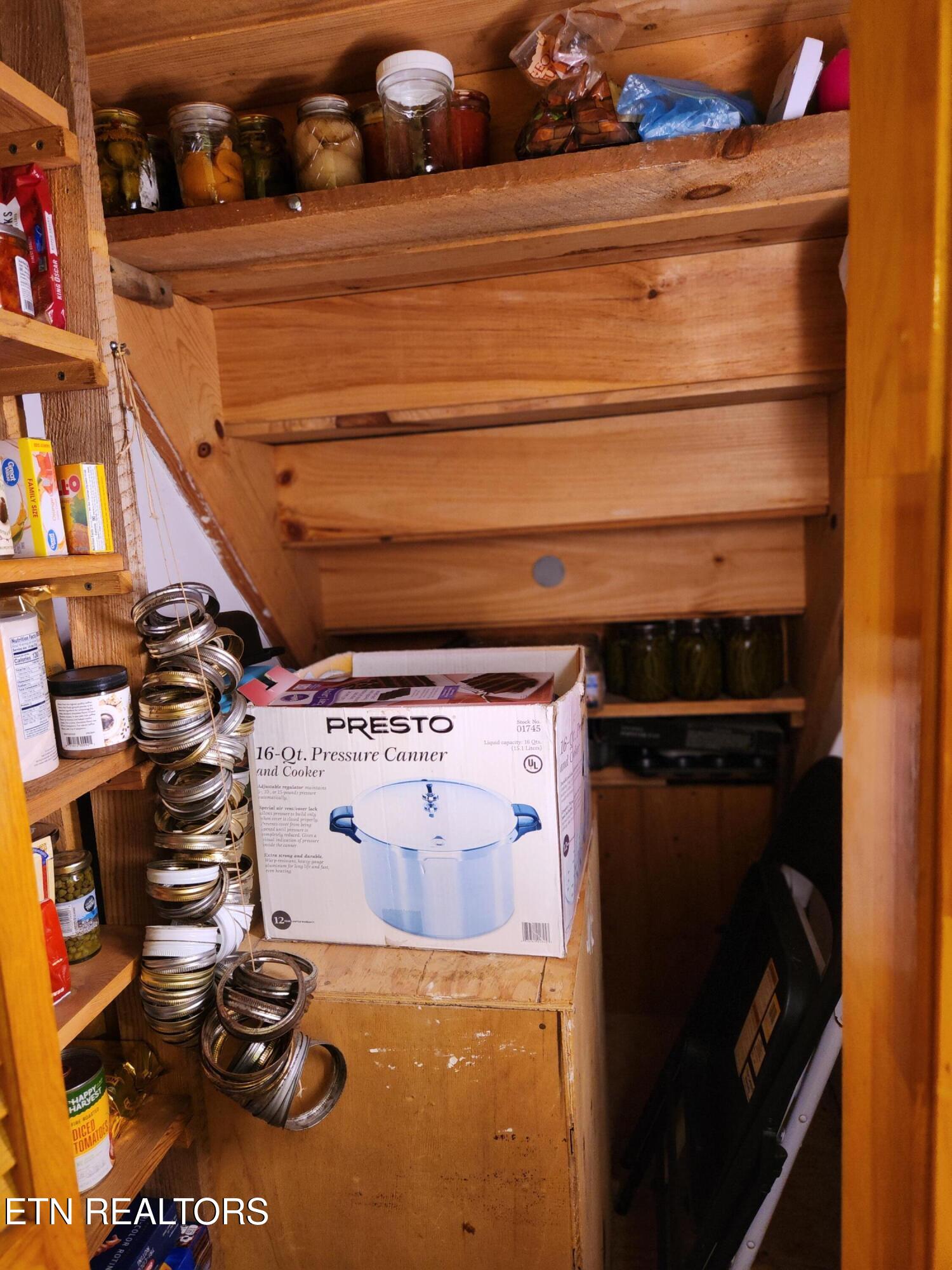 108 Gold Miners Road Tellico Plains, TN 37385 - Photo 16 of 35 Pantry under stairs