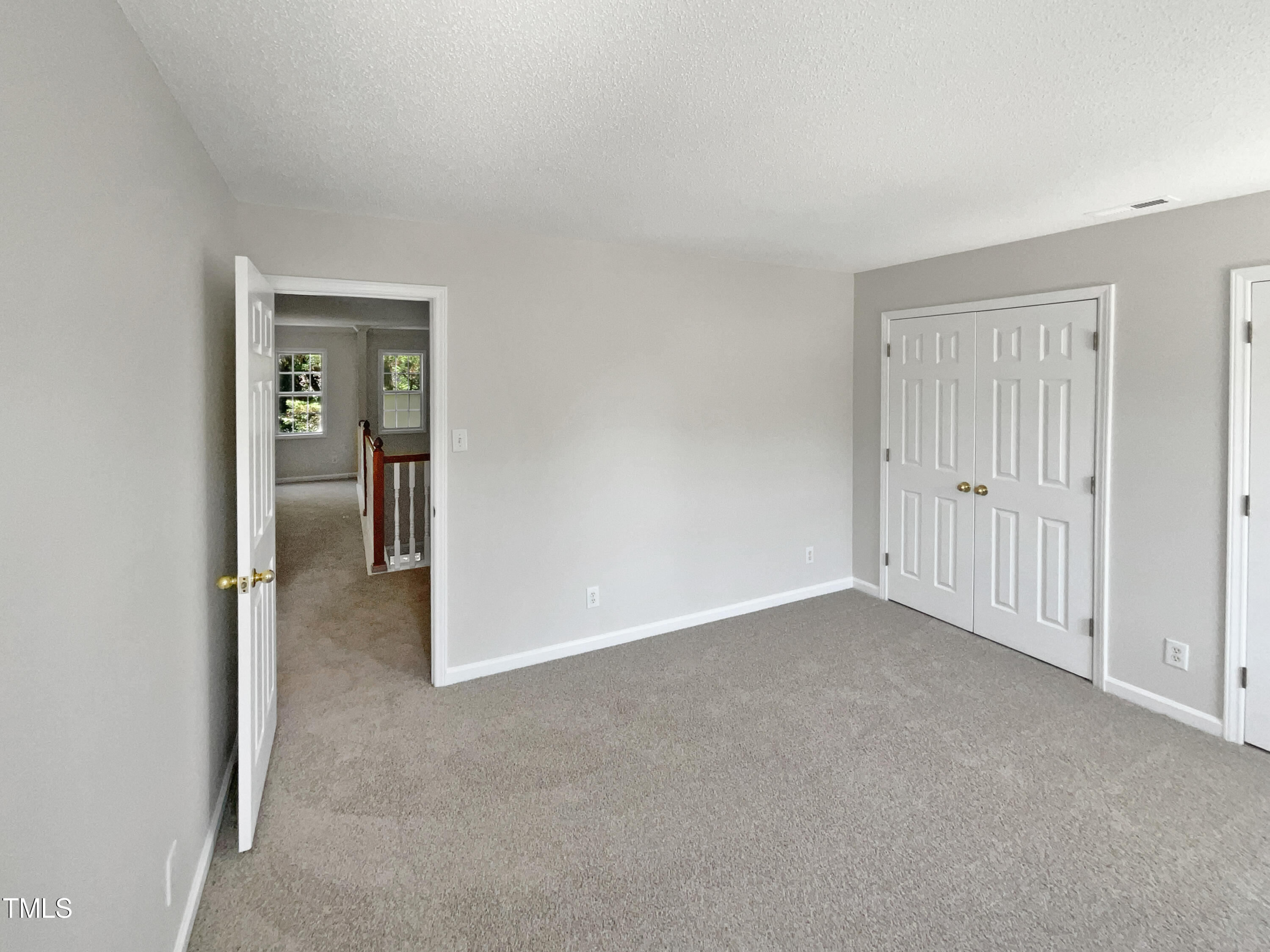 4117 Beaufain Street Raleigh, NC 27604 - Photo 20 of 24 a view of an empty room and closet
