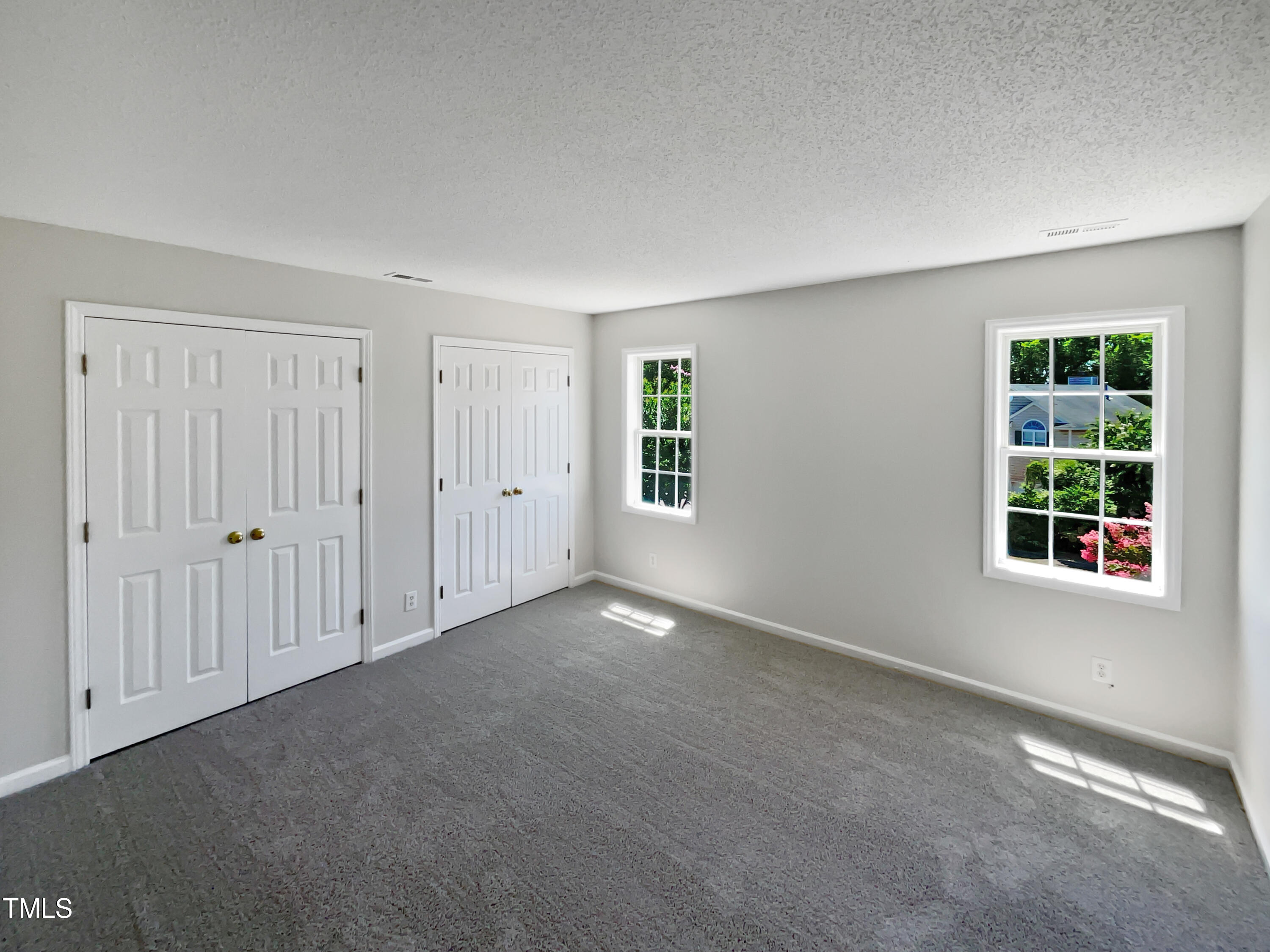 4117 Beaufain Street Raleigh, NC 27604 - Photo 3 of 24 a view of an empty room with a window