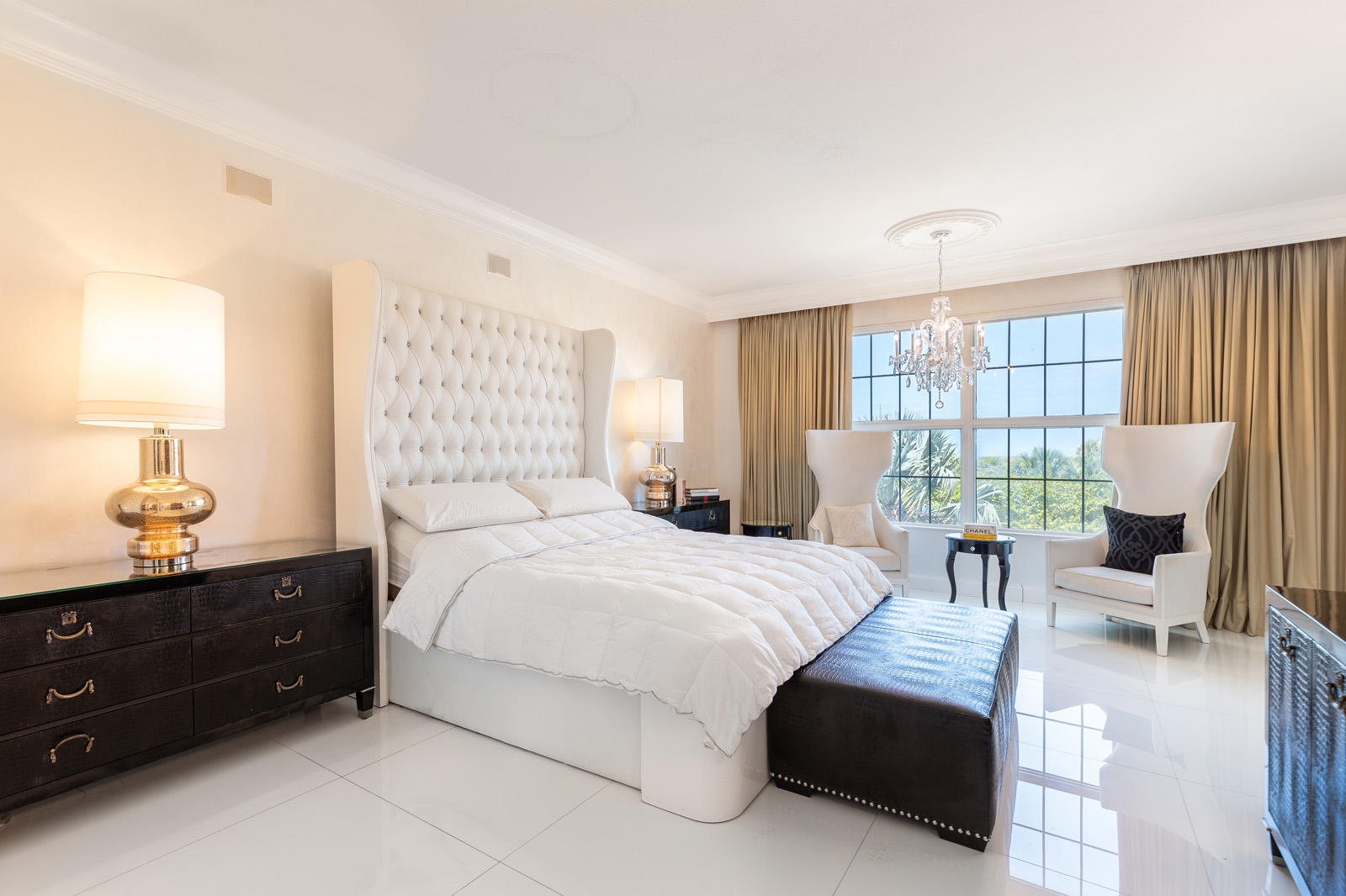 1 North Ocean Boulevard, Unit 305 Boca Raton, FL 33432 - Photo 12 of 27 a bedroom with a bed and window