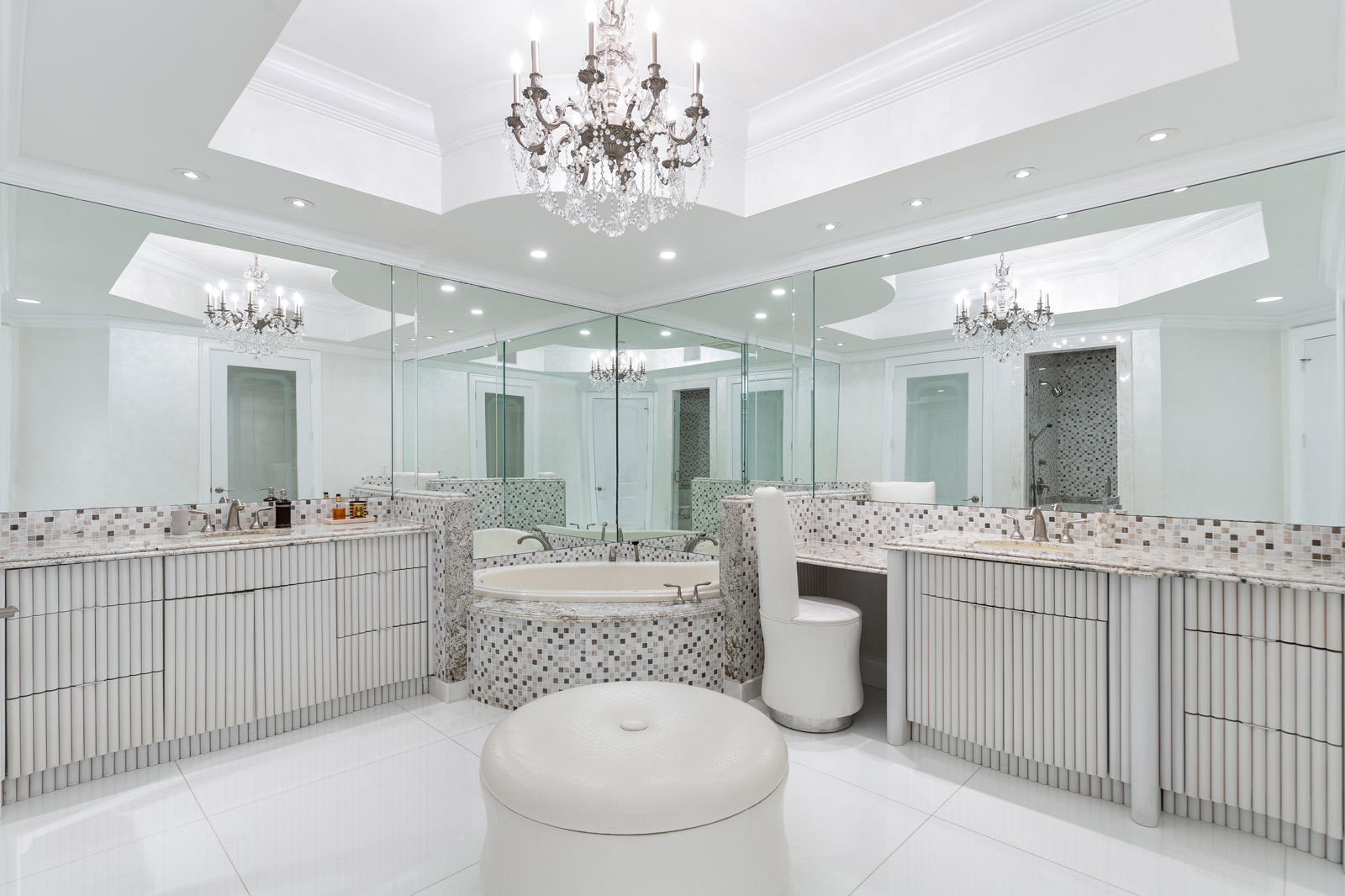 1 North Ocean Boulevard, Unit 305 Boca Raton, FL 33432 - Photo 14 of 27 a bathroom with a double vanity sink mirror and toilet