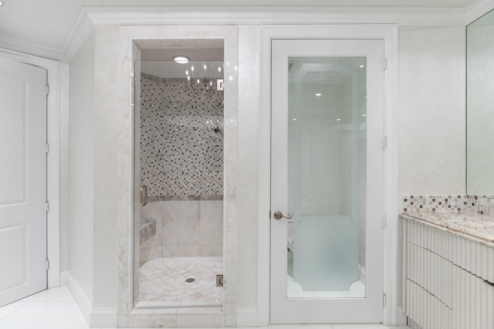 1 North Ocean Boulevard, Unit 305 Boca Raton, FL 33432 - Photo 16 of 27 a bathroom with a shower