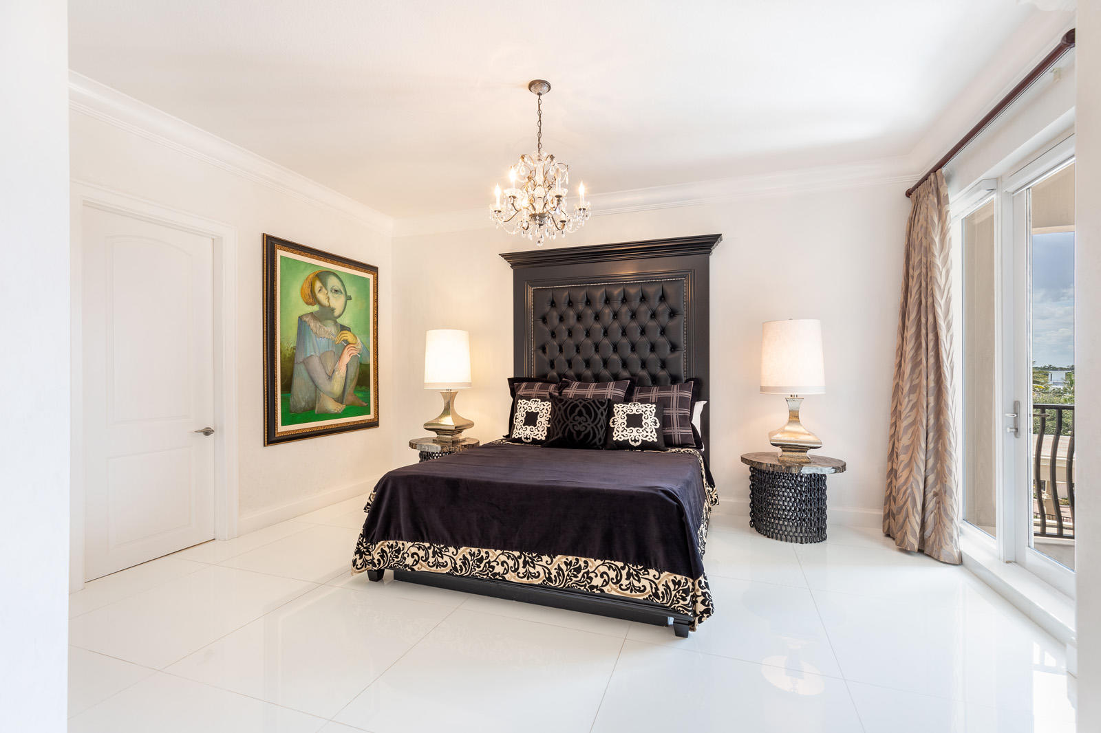 1 North Ocean Boulevard, Unit 305 Boca Raton, FL 33432 - Photo 20 of 27 a bedroom with a bed and a window