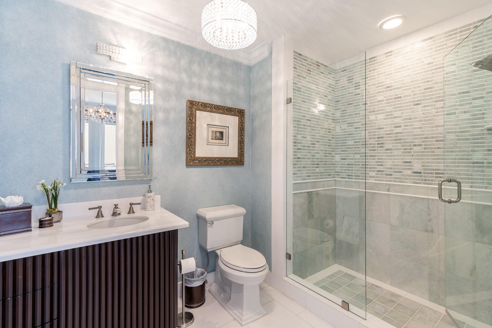 1 North Ocean Boulevard, Unit 305 Boca Raton, FL 33432 - Photo 22 of 27 a bathroom with a sink a toilet and shower