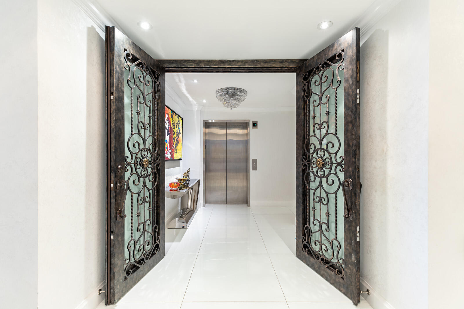 1 North Ocean Boulevard, Unit 305 Boca Raton, FL 33432 - Photo 3 of 27 a view of hallway with stairs and wooden floor