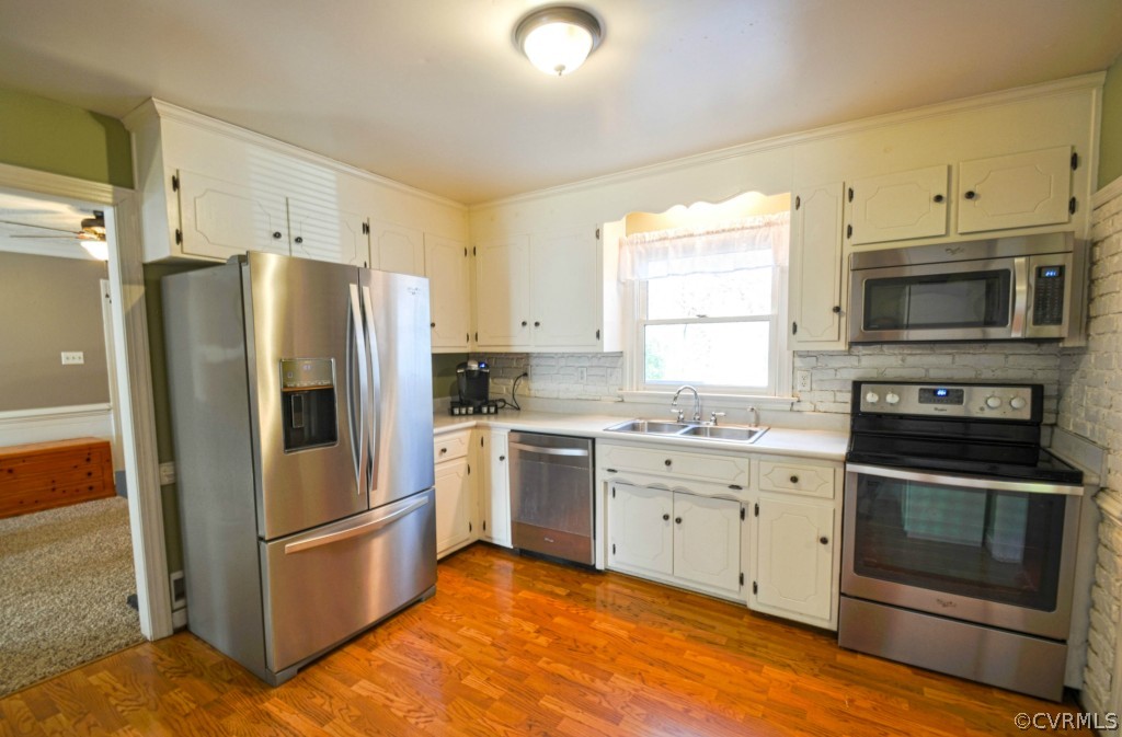 3420 Ludgate Road Chester, VA 23831 - Photo 3 of 24 a kitchen with stainless steel appliances granite countertop a refrigerator stove and sink