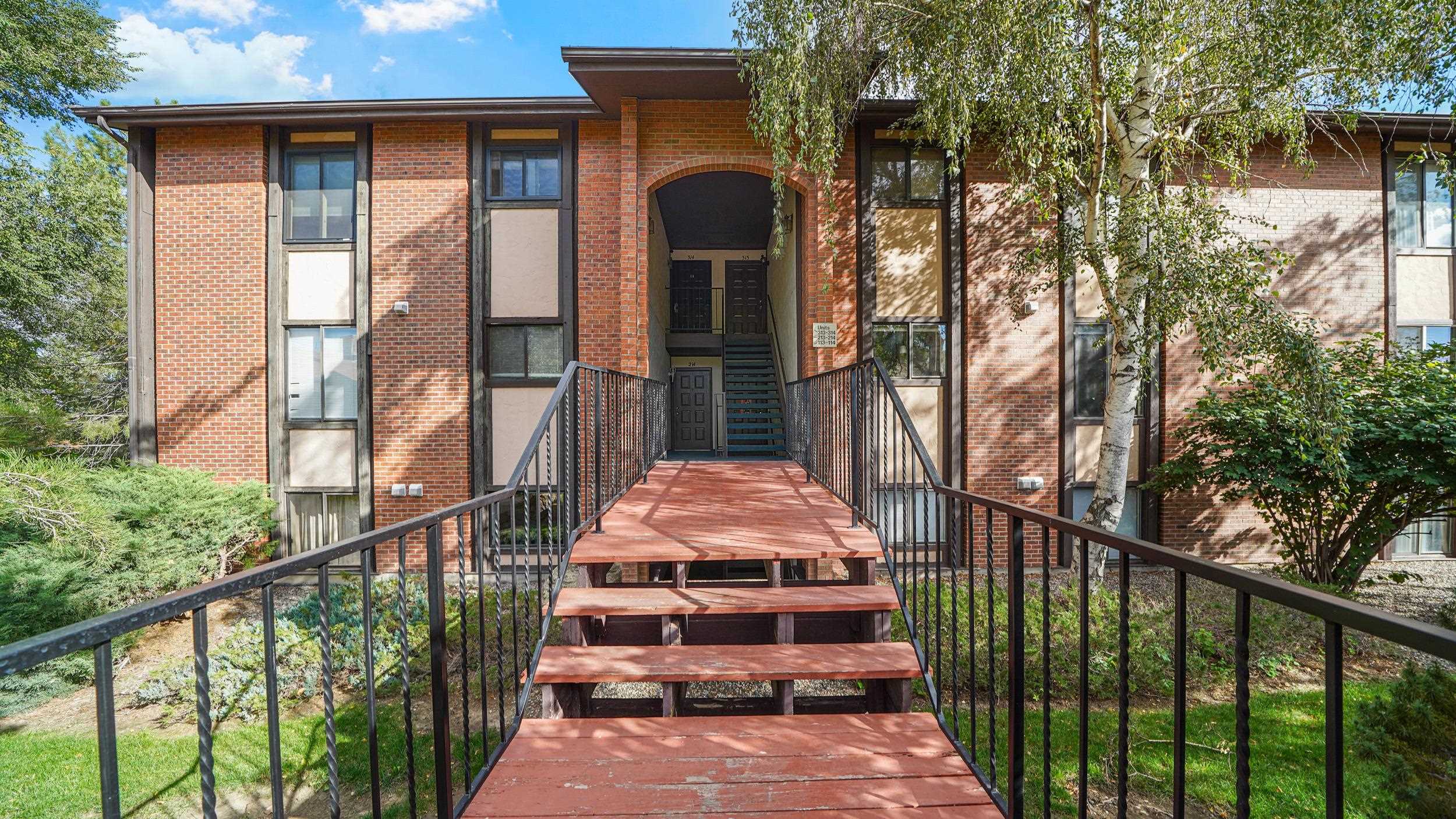 a view of a pathway with a balcony