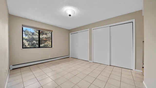 a view of an empty room with window