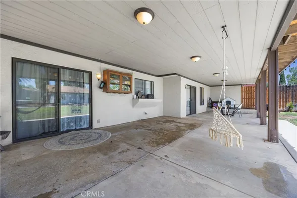 a view of swimming pool with outdoor seating