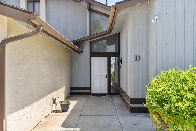 a view of room with furniture and wooden floor