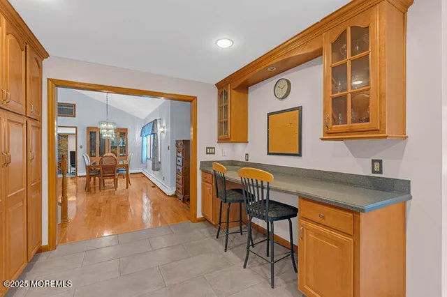 a view of a livingroom with furniture and front door