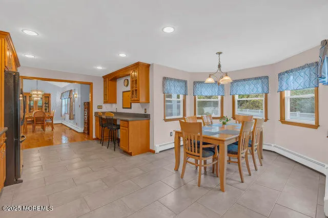 a view of a dining room with furniture