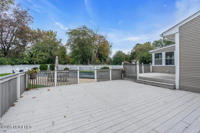 a view of a deck with chairs