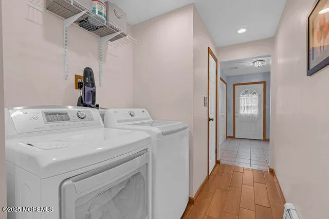a utility room with dryer and washer