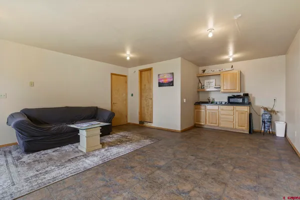 a living room with furniture and a couch