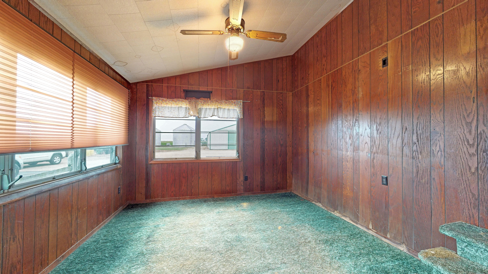 10909 Payne Road Marengo, IL 60152 - Photo 14 of 44 a view of an empty room with windows & cabinet