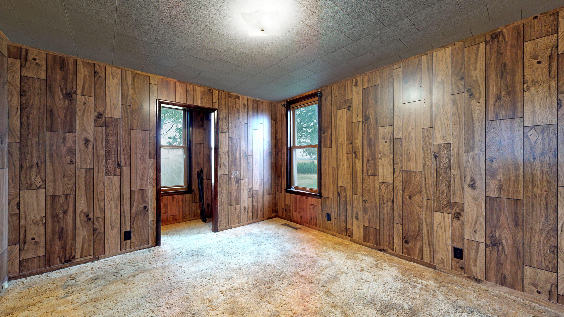 10909 Payne Road Marengo, IL 60152 - Photo 17 of 44 a view of a hallway with wooden walls