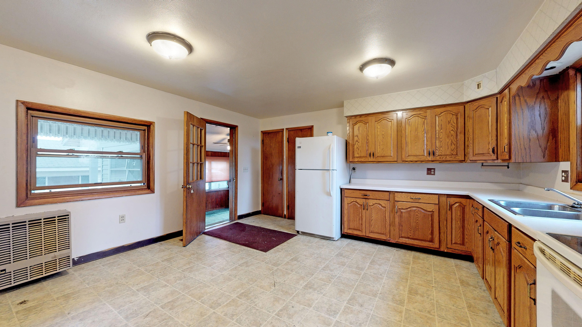 10909 Payne Road Marengo, IL 60152 - Photo 4 of 44 a large kitchen with stainless steel appliances granite countertop a sink stove and cabinets