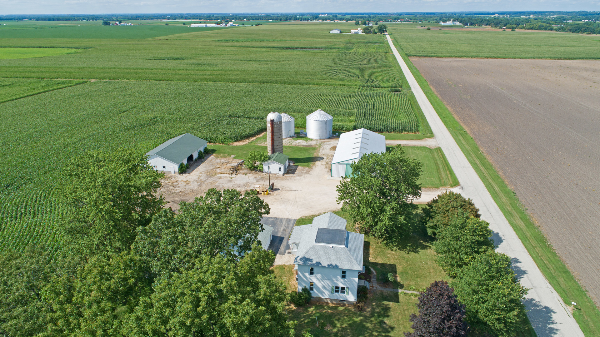 10909 Payne Road Marengo, IL 60152 - Photo 31 of 44 an aerial view of a house with a yard