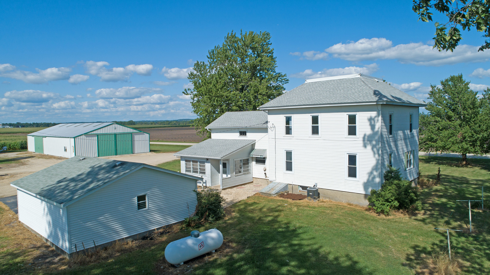 10909 Payne Road Marengo, IL 60152 - Photo 35 of 44 a front view of a house with garden