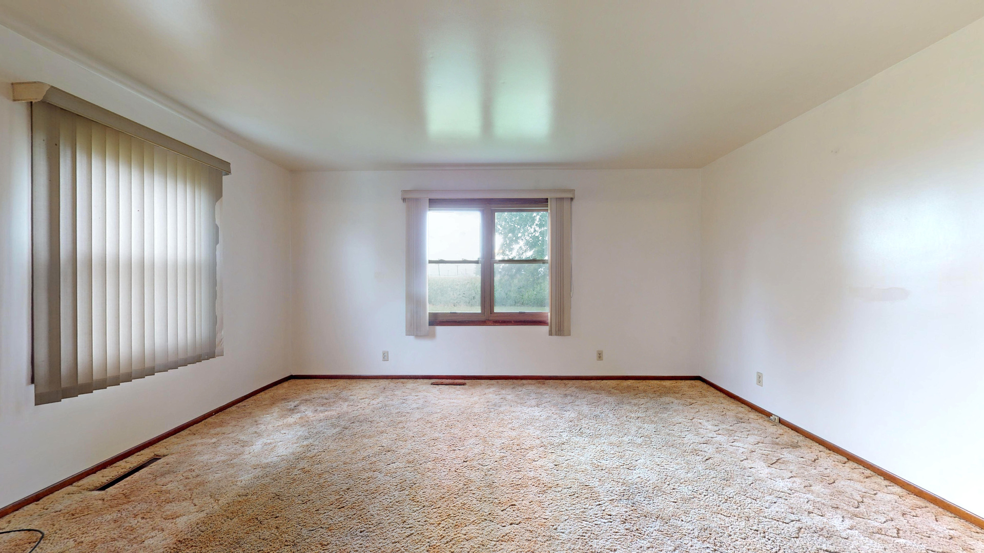 10909 Payne Road Marengo, IL 60152 - Photo 7 of 44 an empty room with a window