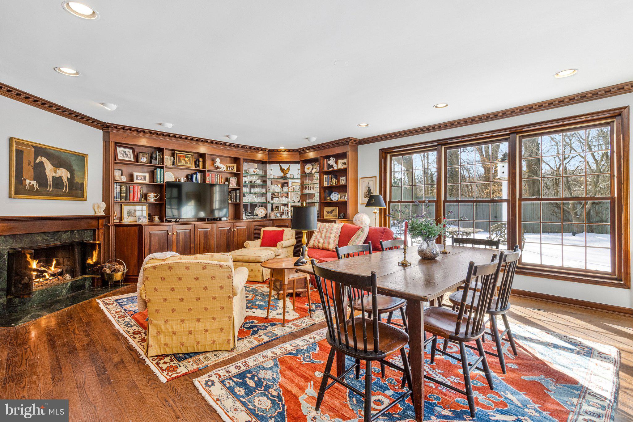 4512 Tournay Road Bethesda, MD 20816 - Photo 15 of 49 Sun-drenched 21 x 17 family room has gas fireplace