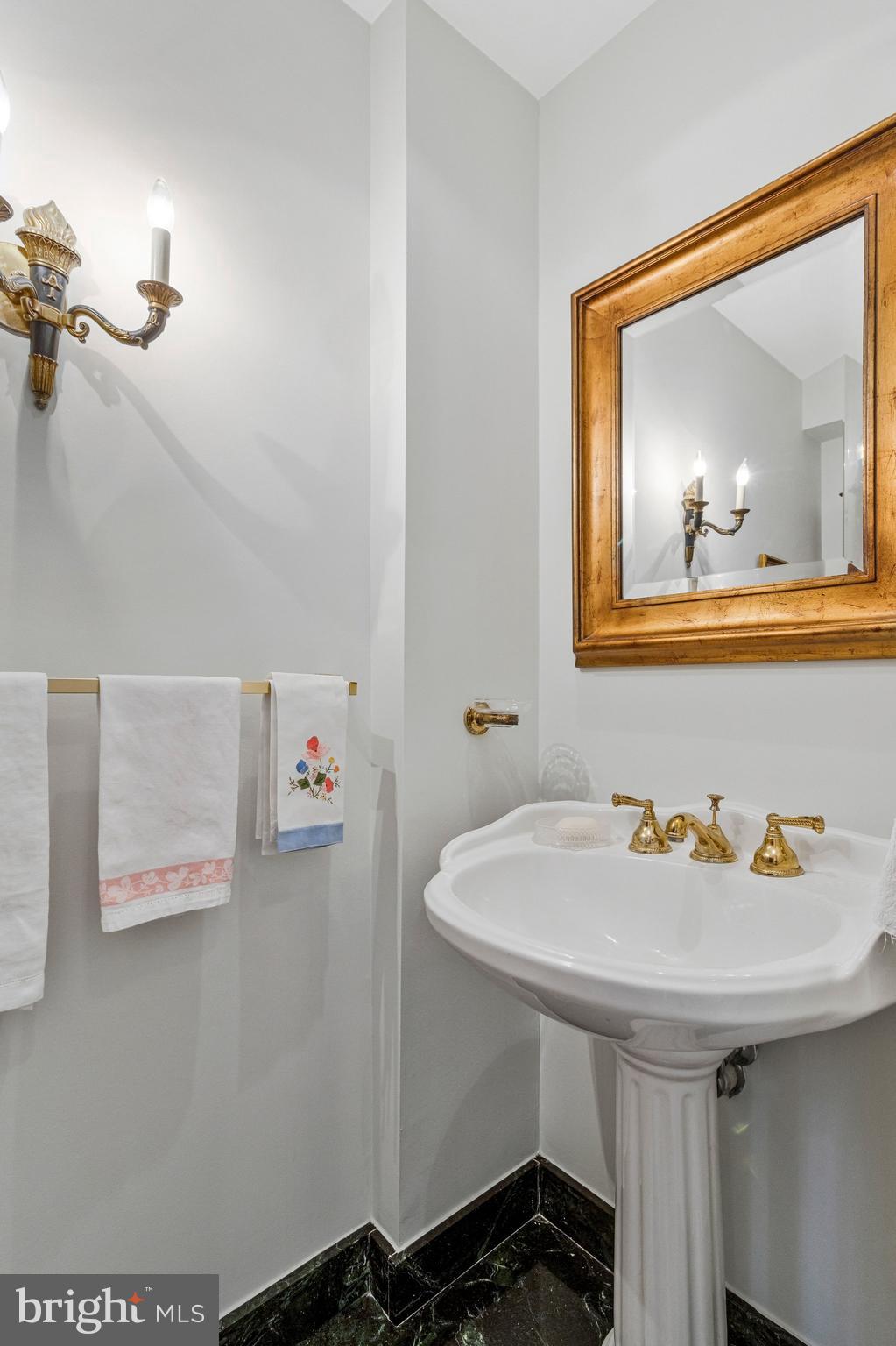 4512 Tournay Road Bethesda, MD 20816 - Photo 23 of 49 1st floor powder room with pedestal sink