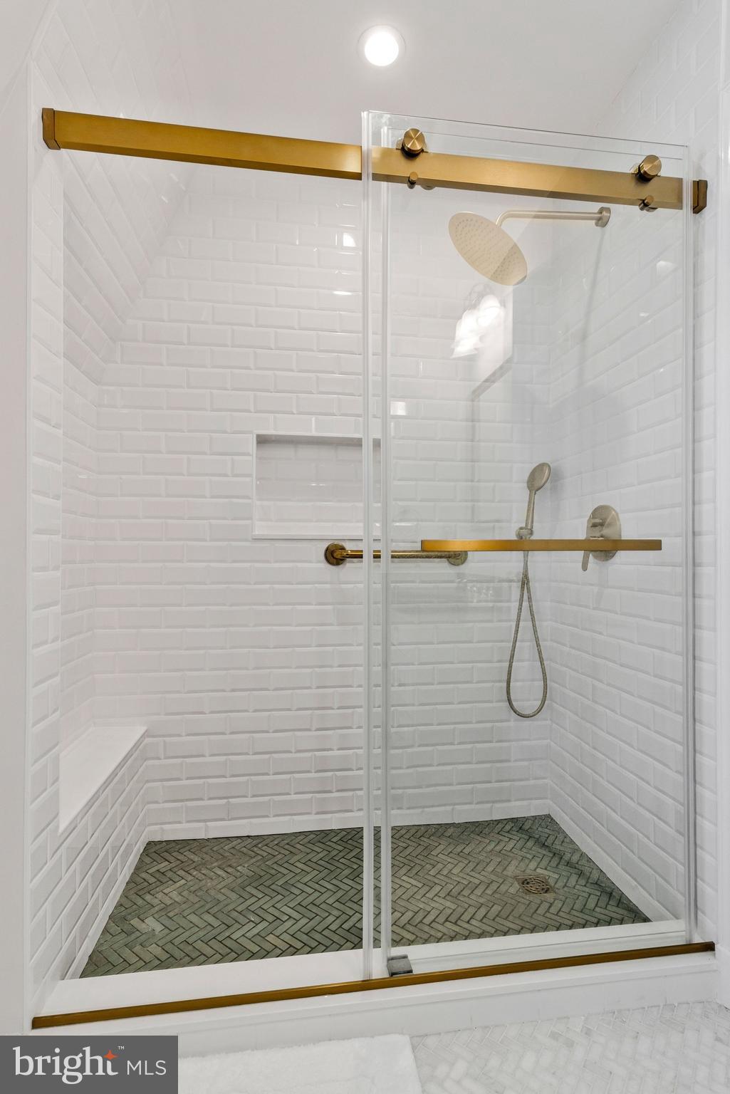 4512 Tournay Road Bethesda, MD 20816 - Photo 25 of 49 Rain-maker shower head in primary BR en-suite bath