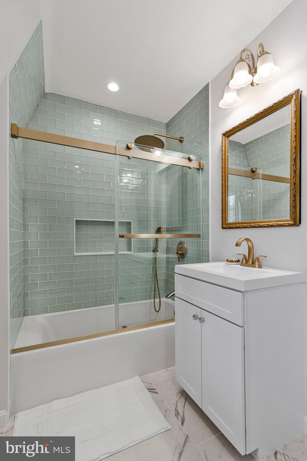 4512 Tournay Road Bethesda, MD 20816 - Photo 32 of 49 Large shower head & designer tile in 2nd BR bath