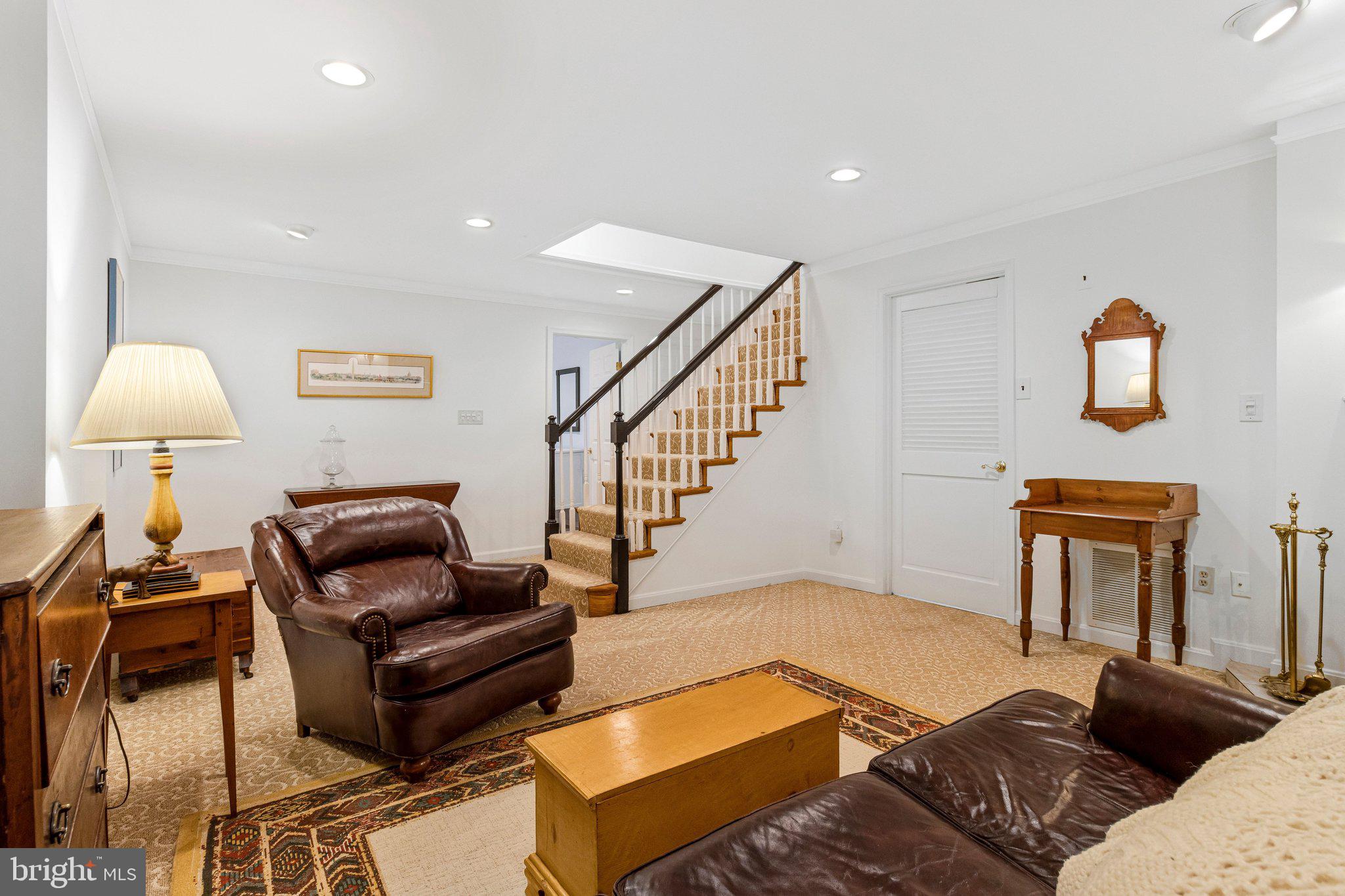 4512 Tournay Road Bethesda, MD 20816 - Photo 38 of 49 Recessed lights, carpeting & window in lower level