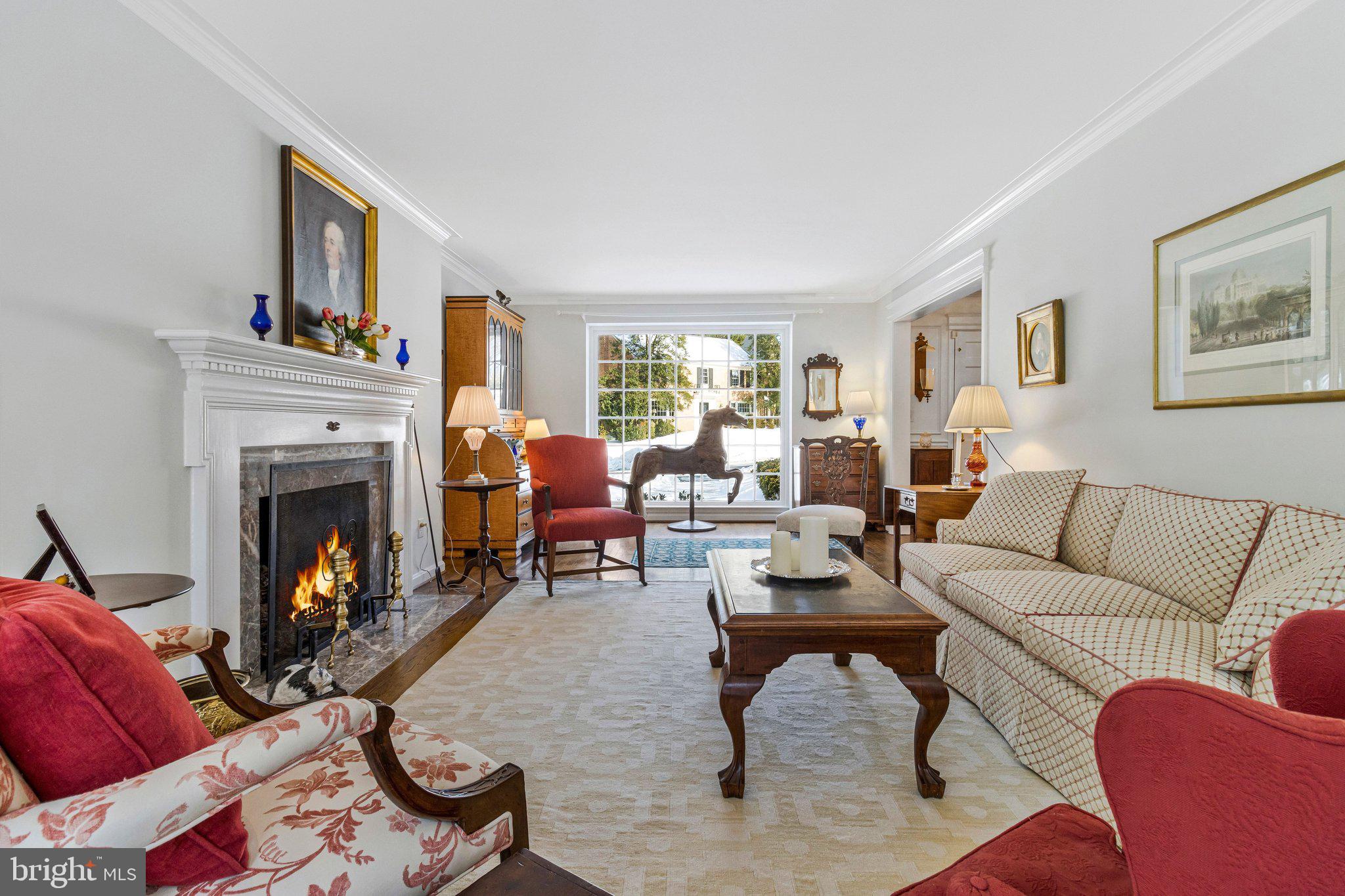 4512 Tournay Road Bethesda, MD 20816 - Photo 9 of 49 Gas fireplace & picture window in living room