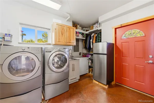 a utility room with dryer and washer