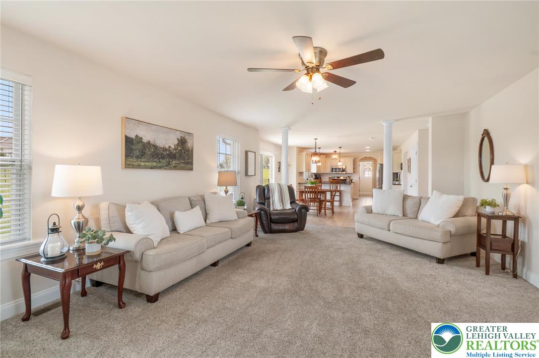 208 East Dell Road Bath, PA 18014 - Photo 15 of 40 a living room with furniture and a chandelier
