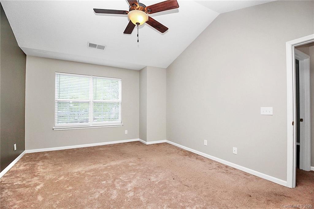 16736 Timber Crossing Road Charlotte, NC 28213 - Photo 22 of 33 a view of an empty room with a window