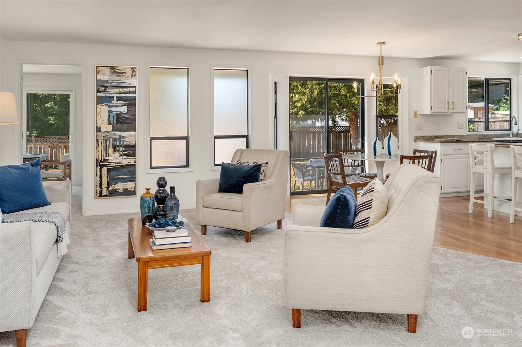 16254 Southeast 144th Street Renton, WA 98059 - Photo 11 of 29 a living room with furniture and large windows