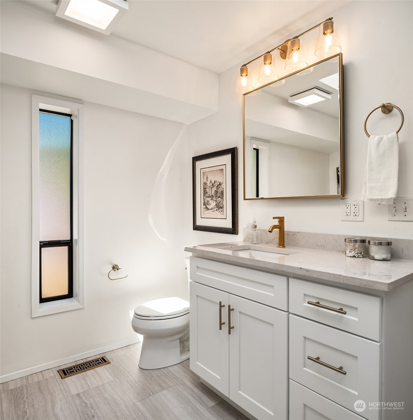 16254 Southeast 144th Street Renton, WA 98059 - Photo 20 of 29 a bathroom with a toilet a sink and mirror