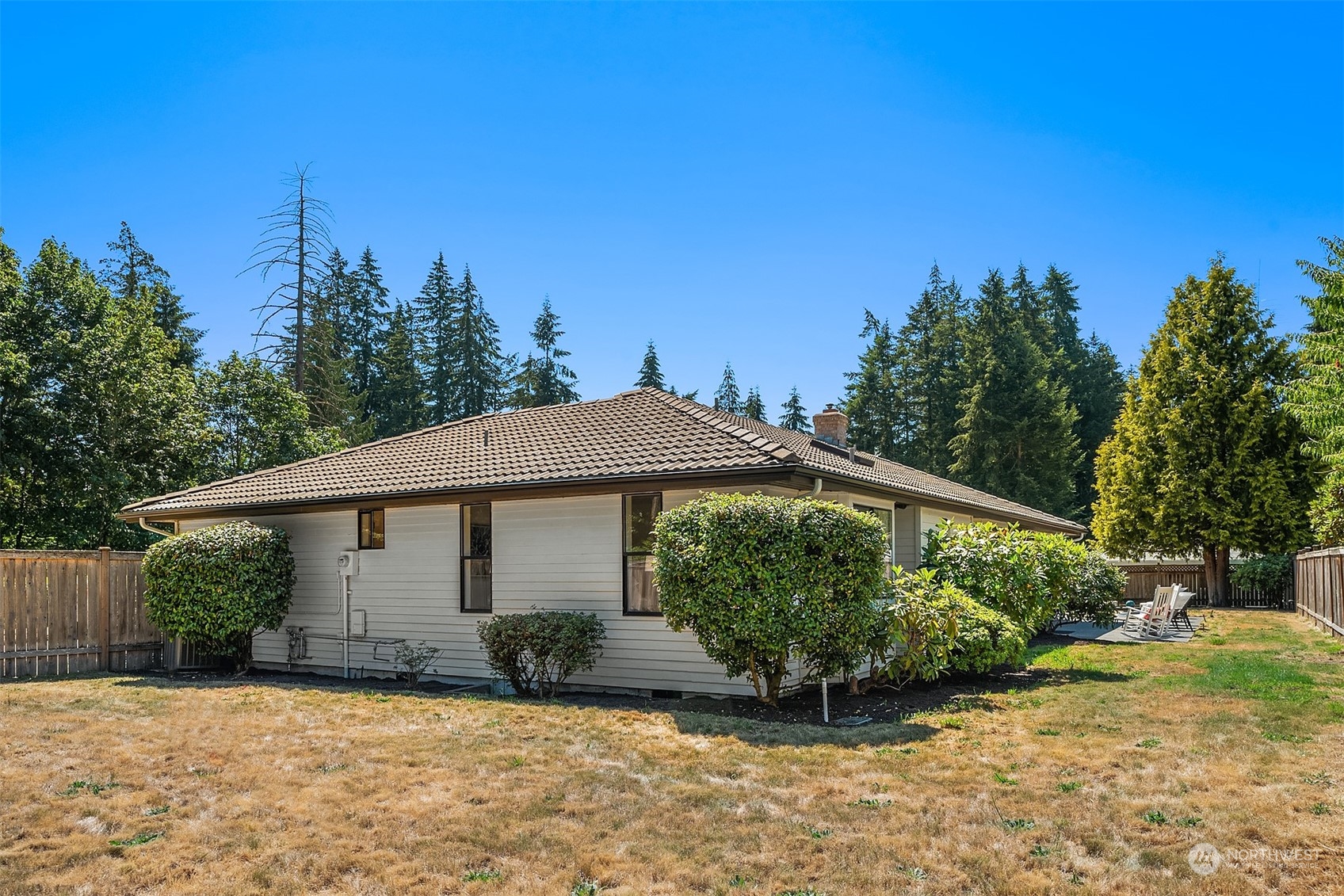 16254 Southeast 144th Street Renton, WA 98059 - Photo 28 of 29 a view of a house with backyard and garden