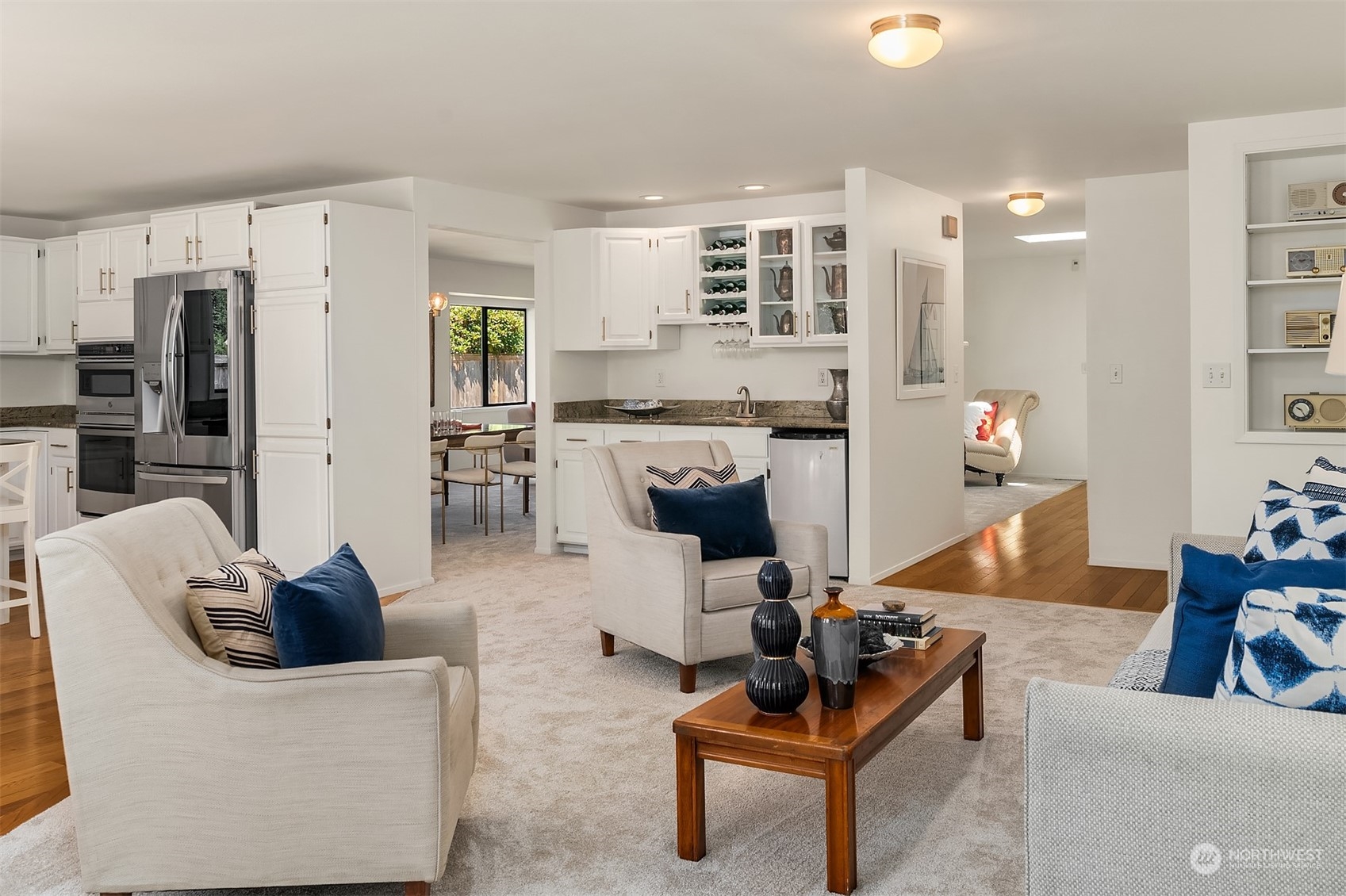 16254 Southeast 144th Street Renton, WA 98059 - Photo 7 of 29 a living room with furniture and kitchen view