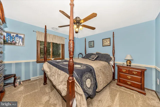 a bathroom with a bathtub and a sink