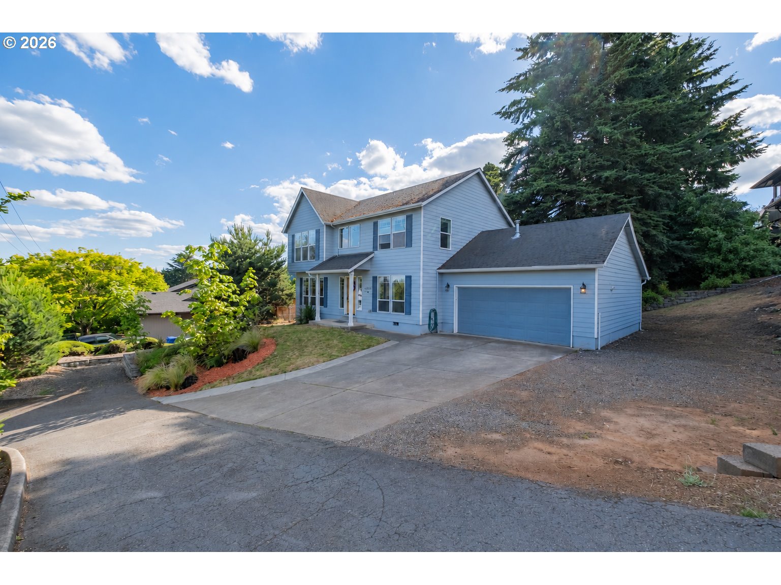 2925 Doaks Ferry Road Northwest Salem, OR 97304 - Photo 2 of 47 a front view of a house with a yard and garage