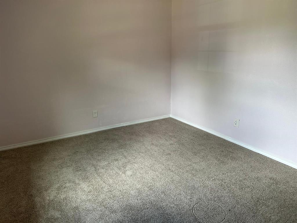 10034 Mill Valley Lane Dallas, TX 75217 - Photo 11 of 18 a view of empty room