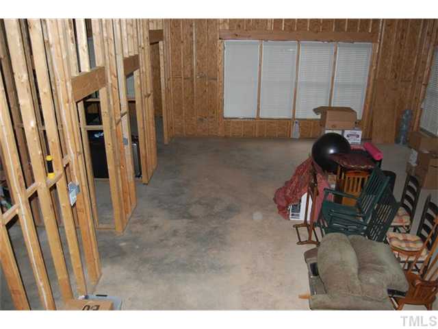 803 Running Brook Trail Raleigh, NC 27609 - Photo 19 of 21 Unfinished basement is framed and plumbed for easy finishing if desired!