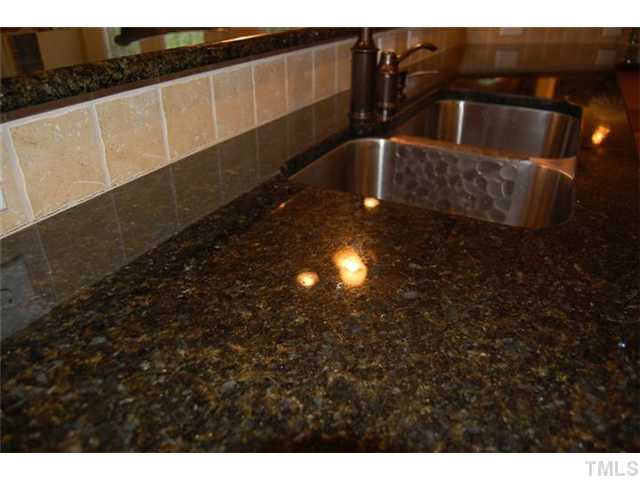 803 Running Brook Trail Raleigh, NC 27609 - Photo 6 of 21 The granite counters are beautiful!
