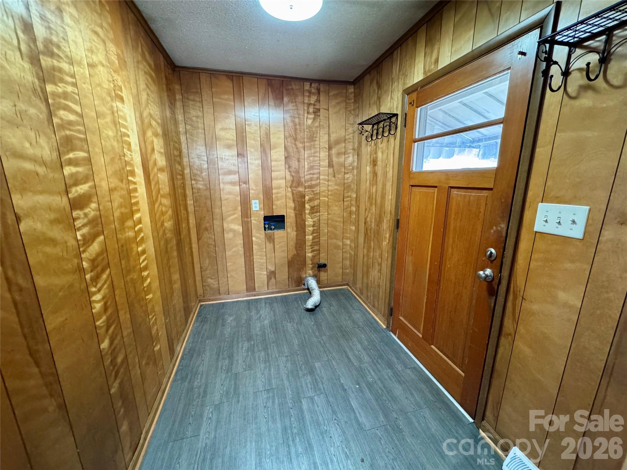 545 Collins Street Kannapolis, NC 28083 - Photo 11 of 27 a view of a hallway with wooden floor and staircase