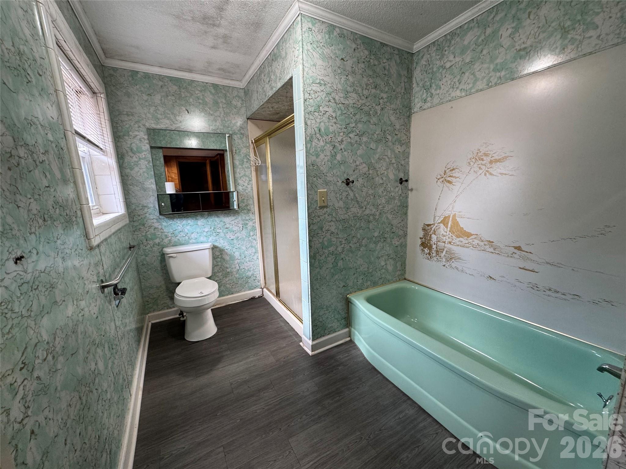 545 Collins Street Kannapolis, NC 28083 - Photo 13 of 27 a bathroom with a sink a toilet and bathtub